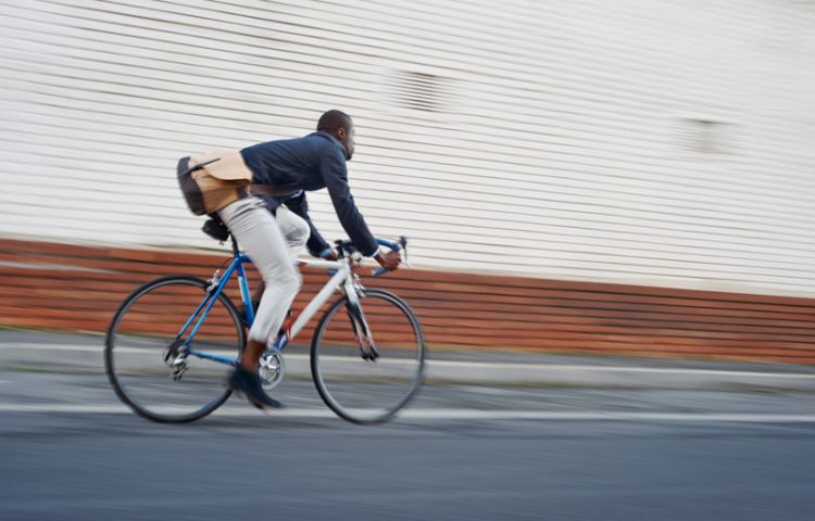 Man riding his bike