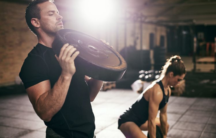 Man and Woman working out together